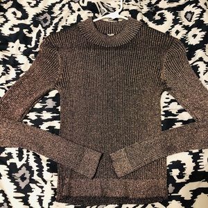 Shimmery tight fitted sweater.
